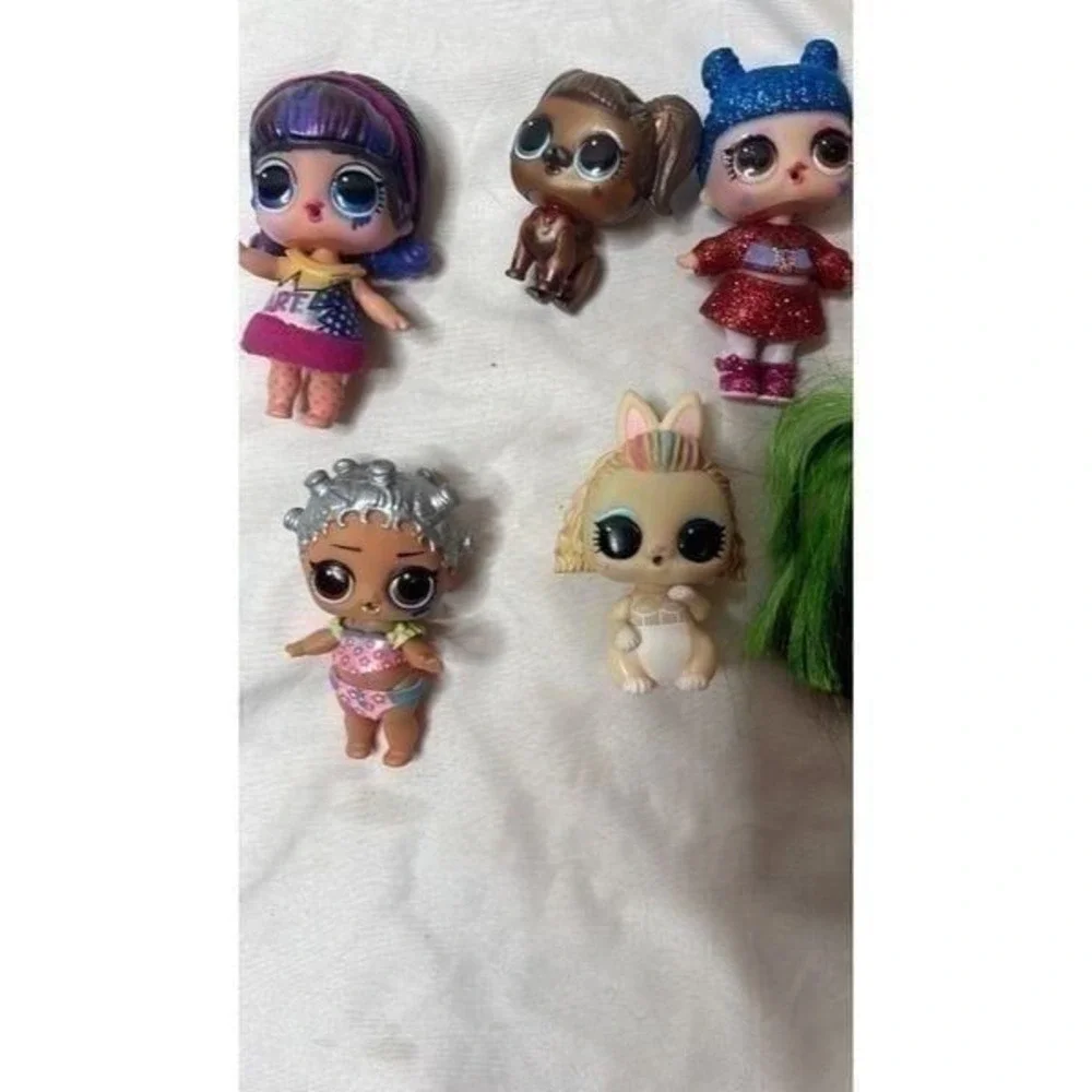 Set Of Nine LOL Surprise Dolls.